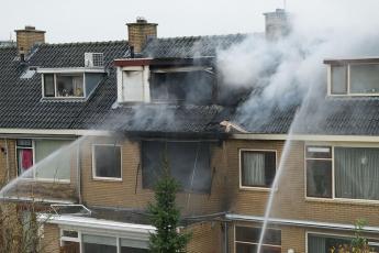 Brand in een rijtjeshuis.